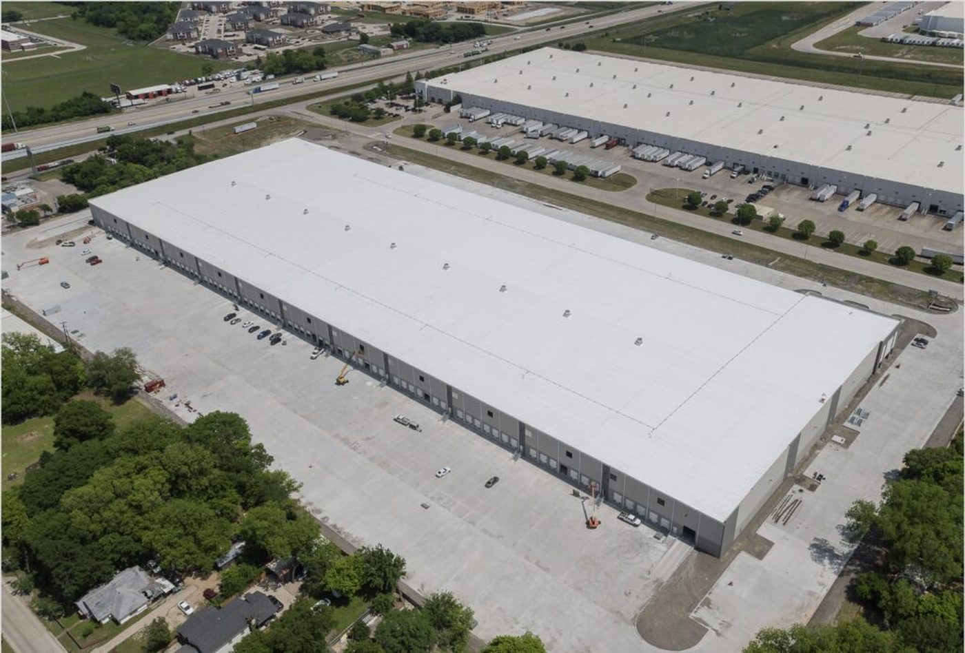Aerial view of the Tradepoint 45 West industrial distribution facility in the Dallas area, with loading docks and truck courts